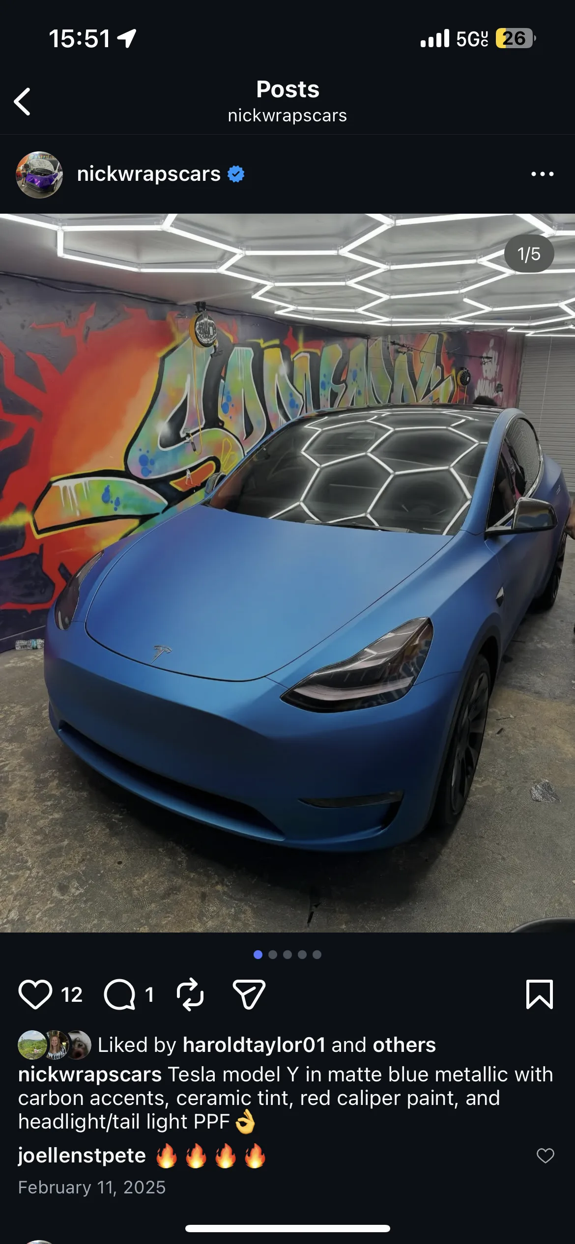 Tesla Model Y, matte blue metallic with carbon accents